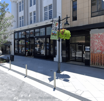 Custom arms, banner arms, and planters with integrated watering system